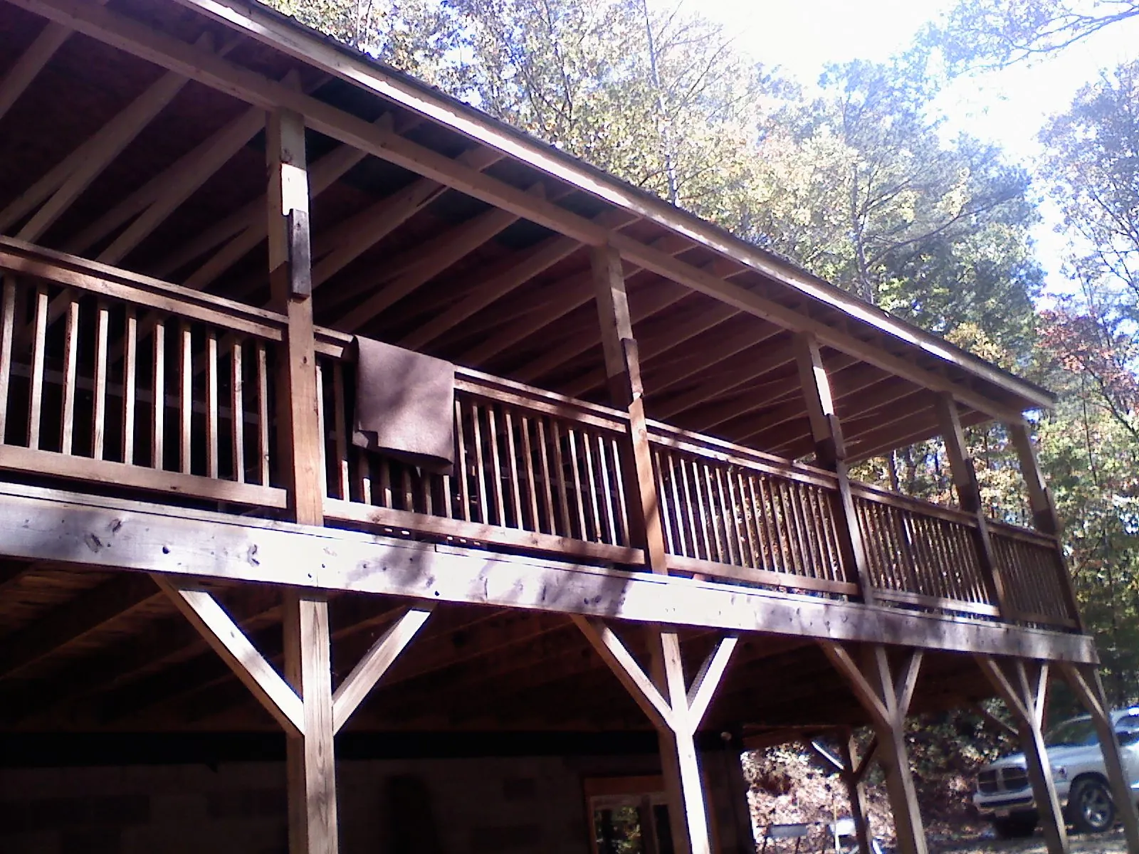 Timber framing under a new elevated porch and deck — Roof Leak Repair in Turtle Lake by Roofing Brothers